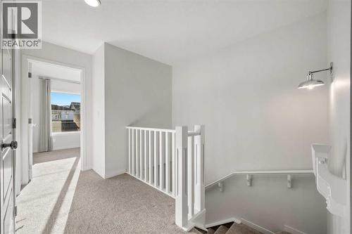 110 Wolf Creek Rise Se, Calgary, AB - Indoor Photo Showing Other Room