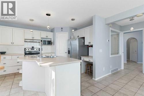 202 Schooner Close Nw, Calgary, AB - Indoor Photo Showing Kitchen With Double Sink