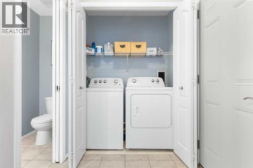 202 Schooner Close Nw, Calgary, AB - Indoor Photo Showing Laundry Room