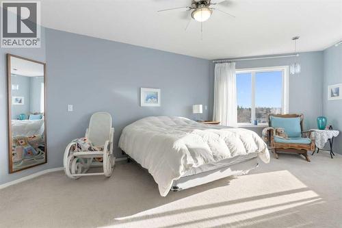 Primary Bedroom - 202 Schooner Close Nw, Calgary, AB - Indoor Photo Showing Bedroom