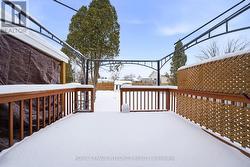 View of back yard from patio doors. - 