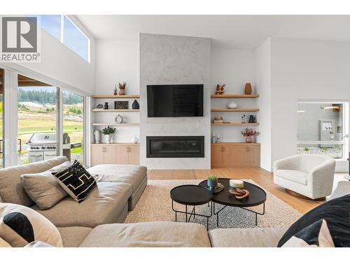 105 Predator Ridge Drive Unit# 22, Vernon, BC - Indoor Photo Showing Living Room With Fireplace