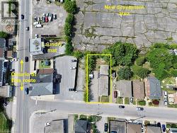 Aerial view of property and surrounding area with property parcel outlined - 