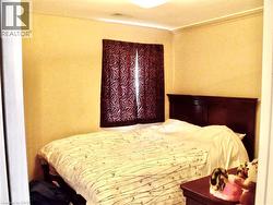 Bedroom featuring crown molding - 