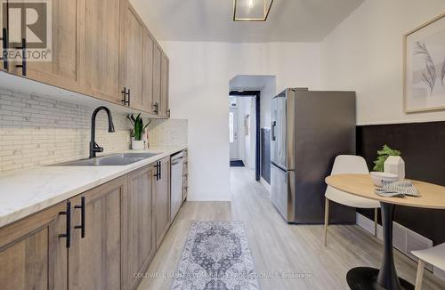 83 Sanford Avenue N, Hamilton, ON - Indoor Photo Showing Kitchen With Double Sink