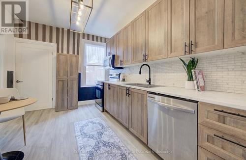 83 Sanford Avenue N, Hamilton, ON - Indoor Photo Showing Kitchen With Double Sink