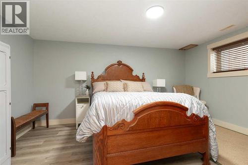 1003 Canyon Boulevard W, Lethbridge, AB - Indoor Photo Showing Bedroom