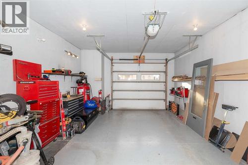 1003 Canyon Boulevard W, Lethbridge, AB - Indoor Photo Showing Garage
