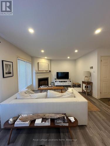378 Mariners Way, Collingwood, ON - Indoor Photo Showing Other Room With Fireplace