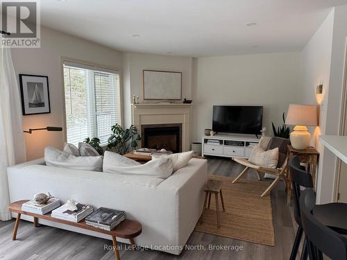 378 Mariners Way, Collingwood, ON - Indoor Photo Showing Living Room With Fireplace
