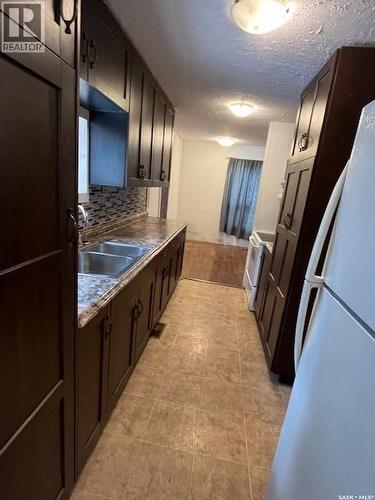 112 Main Street, Harris, SK - Indoor Photo Showing Kitchen With Double Sink