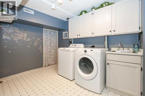 31 Armitage Close, Red Deer, AB - Indoor Photo Showing Laundry Room