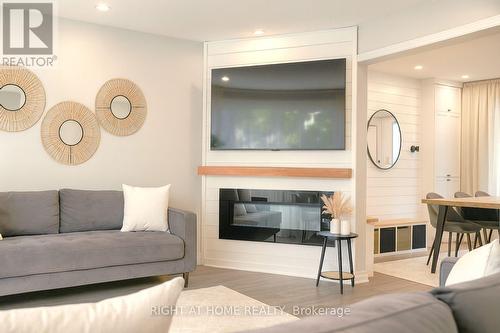 347 Zephyr Avenue, Ottawa, ON - Indoor Photo Showing Living Room With Fireplace
