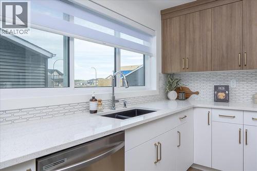 540 Legacy Circle Se, Calgary, AB - Indoor Photo Showing Kitchen With Double Sink With Upgraded Kitchen