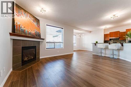 10 Everglen Crescent Sw, Calgary, AB - Indoor Photo Showing Living Room With Fireplace