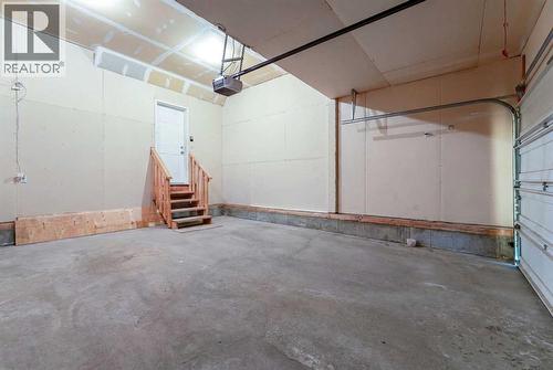 10 Everglen Crescent Sw, Calgary, AB - Indoor Photo Showing Garage