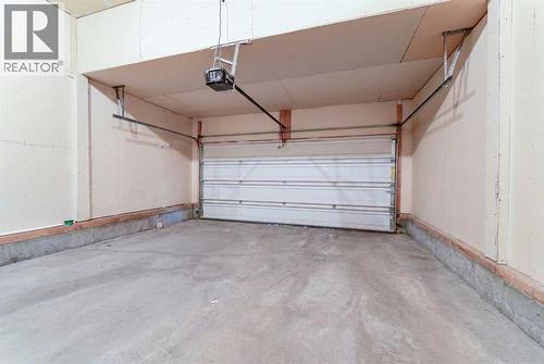 10 Everglen Crescent Sw, Calgary, AB - Indoor Photo Showing Garage