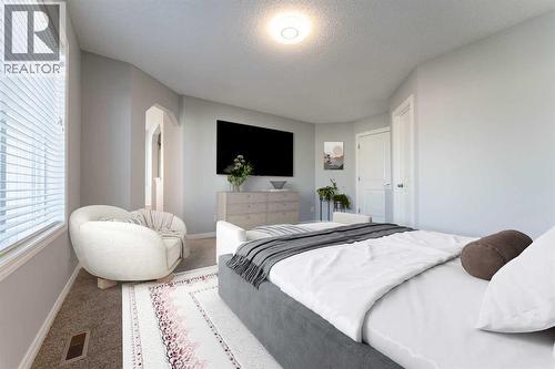 10 Everglen Crescent Sw, Calgary, AB - Indoor Photo Showing Bedroom