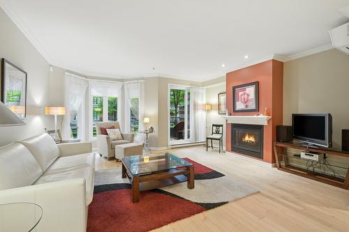 Salon - 2-38 Av. Ste-Hélène, Saint-Lambert, QC - Indoor Photo Showing Living Room With Fireplace