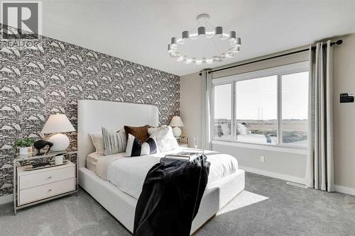 240 Layton Link Se, Airdrie, AB - Indoor Photo Showing Bedroom