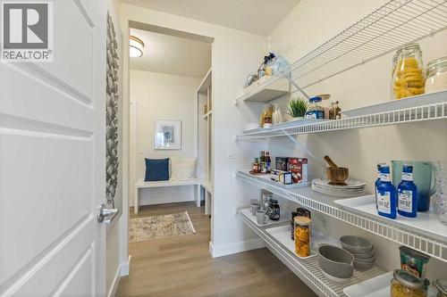 65 Emberside Grove, Cochrane, AB - Indoor Photo Showing Other Room