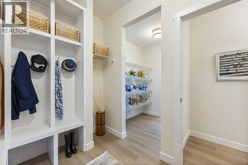 65 Emberside Grove, Cochrane, AB - Indoor Photo Showing Other Room