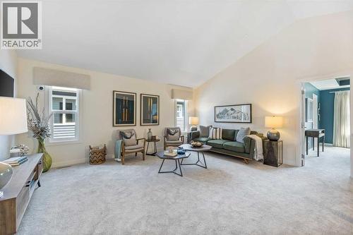 65 Emberside Grove, Cochrane, AB - Indoor Photo Showing Living Room