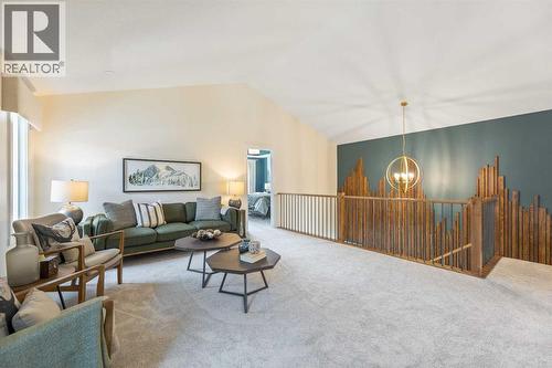 65 Emberside Grove, Cochrane, AB - Indoor Photo Showing Living Room