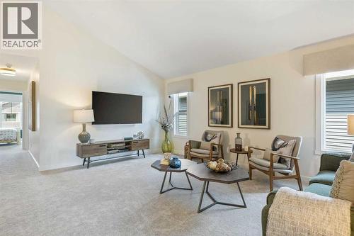 65 Emberside Grove, Cochrane, AB - Indoor Photo Showing Living Room