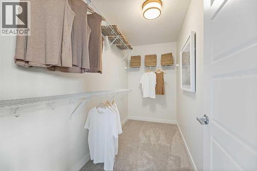 65 Emberside Grove, Cochrane, AB - Indoor With Storage