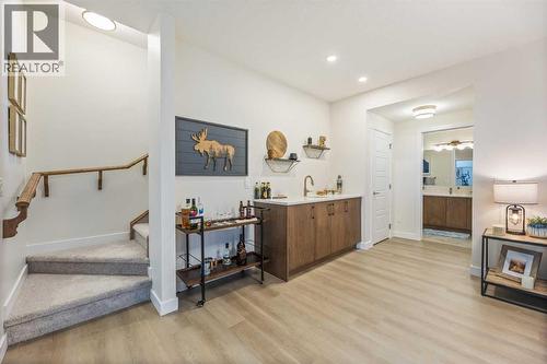 65 Emberside Grove, Cochrane, AB - Indoor Photo Showing Other Room