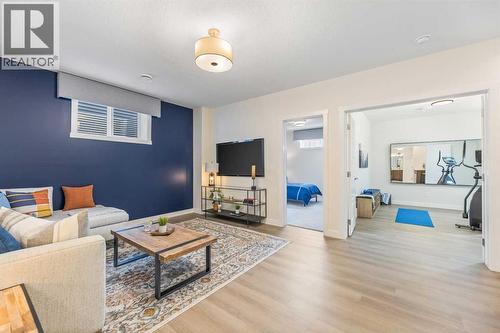 65 Emberside Grove, Cochrane, AB - Indoor Photo Showing Living Room
