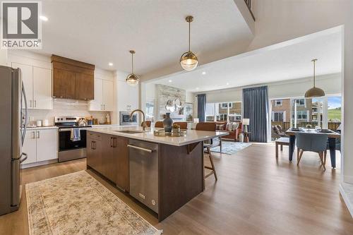 65 Emberside Grove, Cochrane, AB - Indoor Photo Showing Kitchen With Upgraded Kitchen