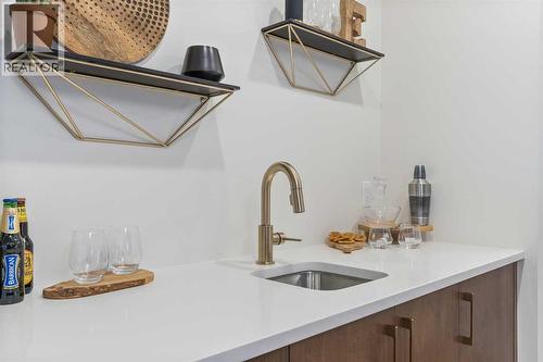 65 Emberside Grove, Cochrane, AB - Indoor Photo Showing Kitchen
