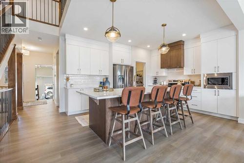 65 Emberside Grove, Cochrane, AB - Indoor Photo Showing Other Room