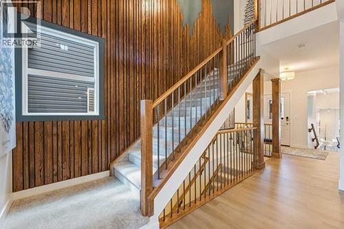 65 Emberside Grove, Cochrane, AB - Indoor Photo Showing Other Room