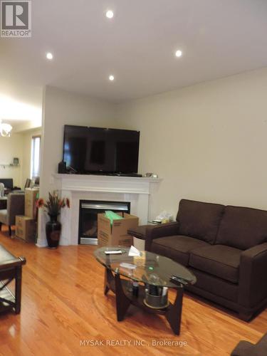 1016 Caven Street, Mississauga, ON - Indoor Photo Showing Living Room With Fireplace
