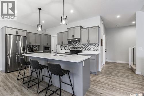 343 Stilling Manor, Saskatoon, SK - Indoor Photo Showing Kitchen With Stainless Steel Kitchen With Double Sink With Upgraded Kitchen