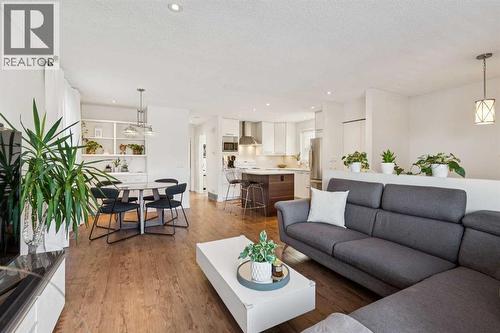 65 Tararidge Close Ne, Calgary, AB - Indoor Photo Showing Living Room