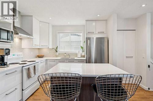 65 Tararidge Close Ne, Calgary, AB - Indoor Photo Showing Kitchen