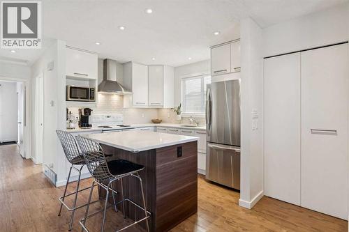 65 Tararidge Close Ne, Calgary, AB - Indoor Photo Showing Kitchen With Upgraded Kitchen