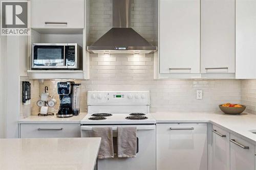 65 Tararidge Close Ne, Calgary, AB - Indoor Photo Showing Kitchen