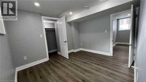 Basement featuring dark wood-style floors and recessed lighting - 29 Birchcliffe Crescent Unit# 2, Hamilton, ON - Indoor Photo Showing Other Room