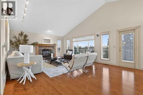 55 Billy Haynes Trail, Okotoks, AB - Indoor Photo Showing Living Room With Fireplace