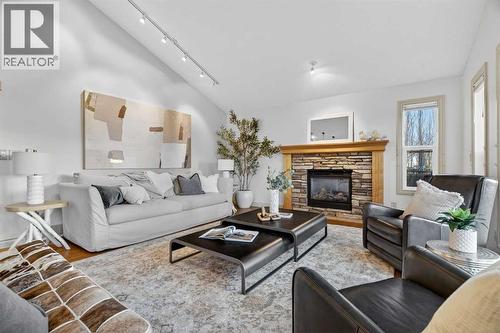 55 Billy Haynes Trail, Okotoks, AB - Indoor Photo Showing Living Room With Fireplace