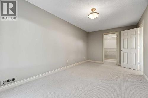55 Billy Haynes Trail, Okotoks, AB - Indoor Photo Showing Other Room