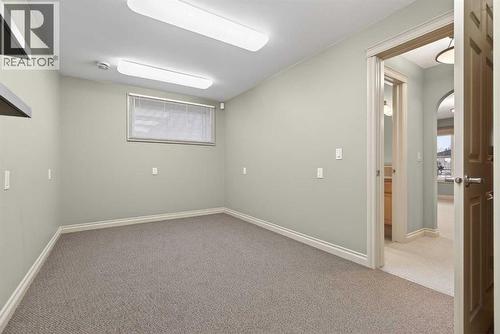 55 Billy Haynes Trail, Okotoks, AB - Indoor Photo Showing Other Room