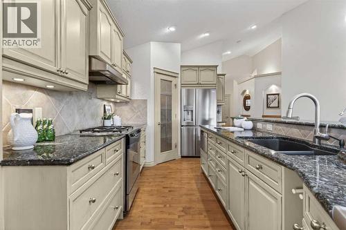 55 Billy Haynes Trail, Okotoks, AB - Indoor Photo Showing Kitchen With Stainless Steel Kitchen With Double Sink With Upgraded Kitchen