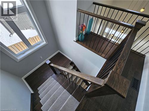 Grand Staircase filled with tons of Natural Light - 46 Stonebridge Place, Simcoe, ON - Indoor Photo Showing Other Room