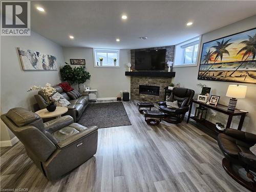 Living Room with Gas Fireplace - 46 Stonebridge Place, Simcoe, ON - Indoor With Fireplace
